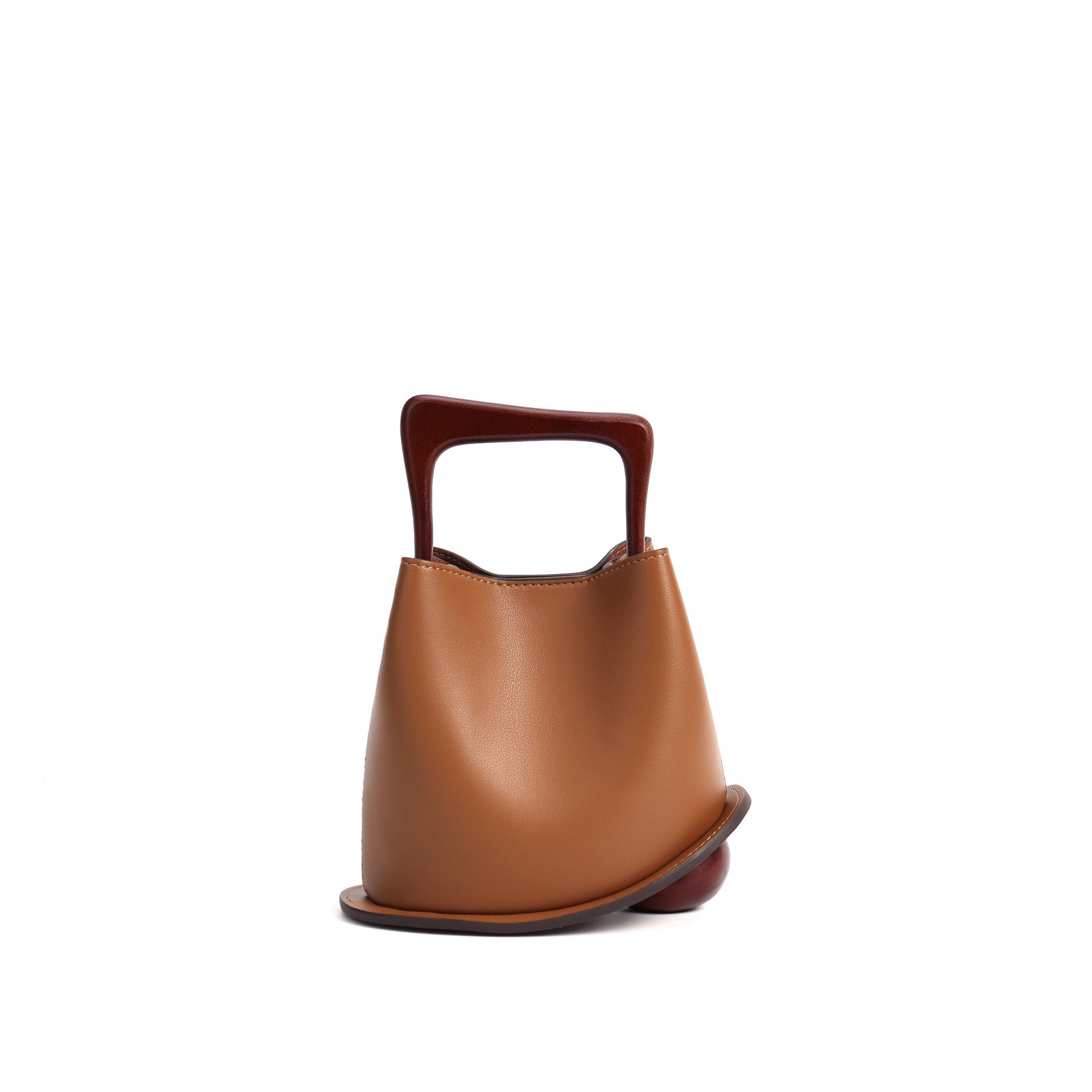 Brown leather handbag with a handle on a white background