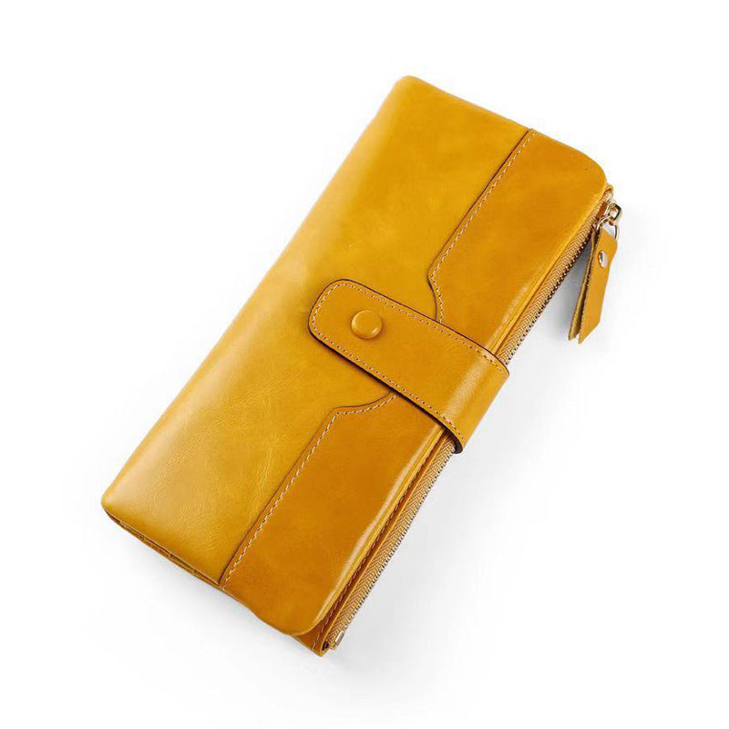 Yellow leather wallet on a white background