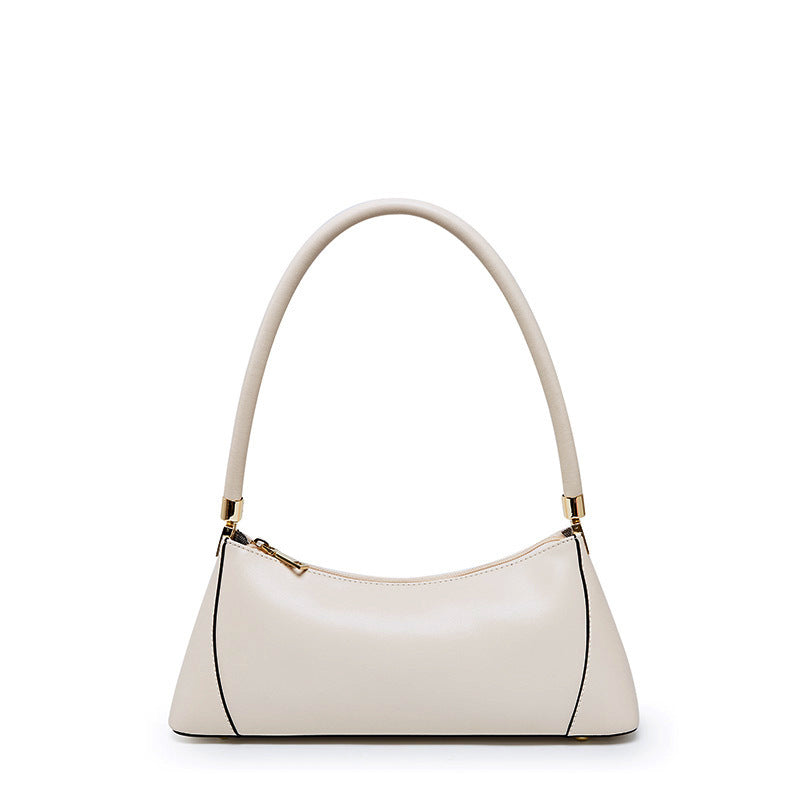 White handbag with gold accents on a white background