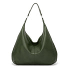 Green handbag on a white background