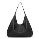 Black leather handbag on a white background
