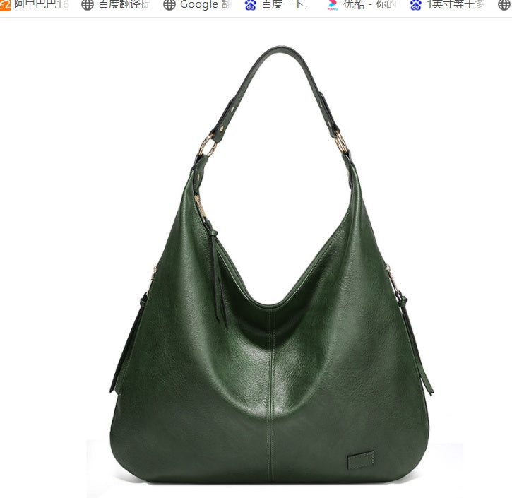 Green handbag on a white background