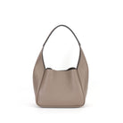 Beige handbag on a white background