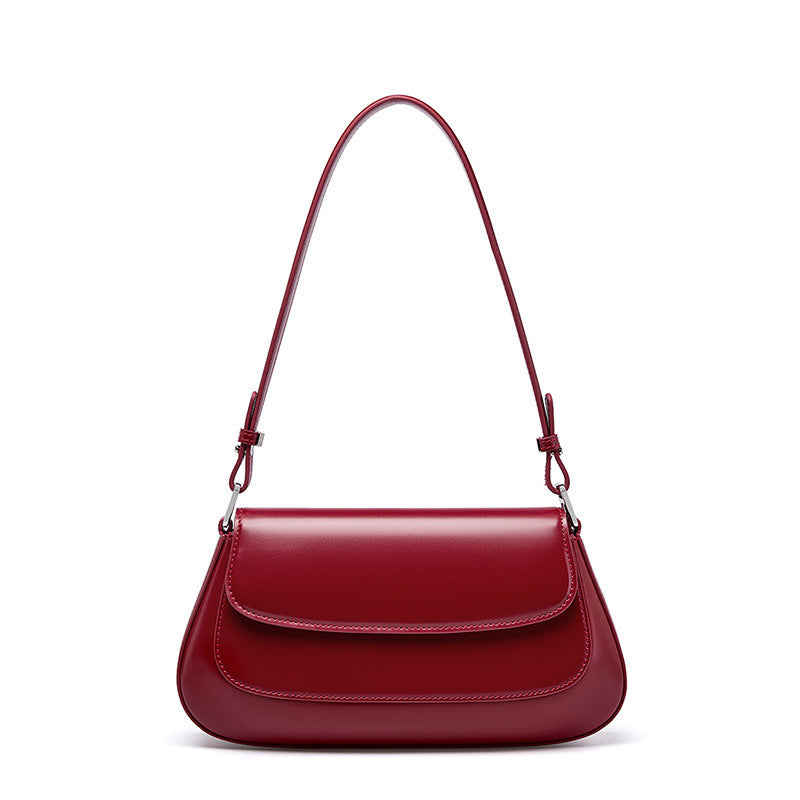 Red handbag on a white background