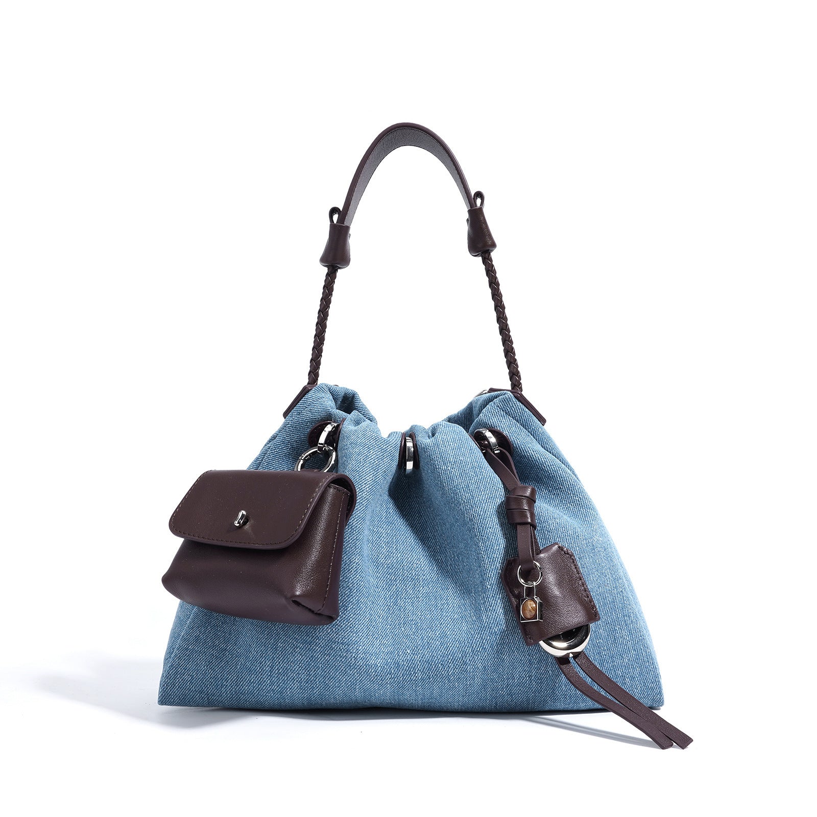 Light Blue Denim handbag with brown leather accents on a white background
