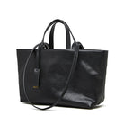 Black leather tote bag with shoulder strap on a white background