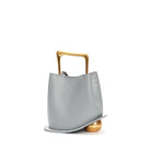 Gray handbag with a gold handle on a white background