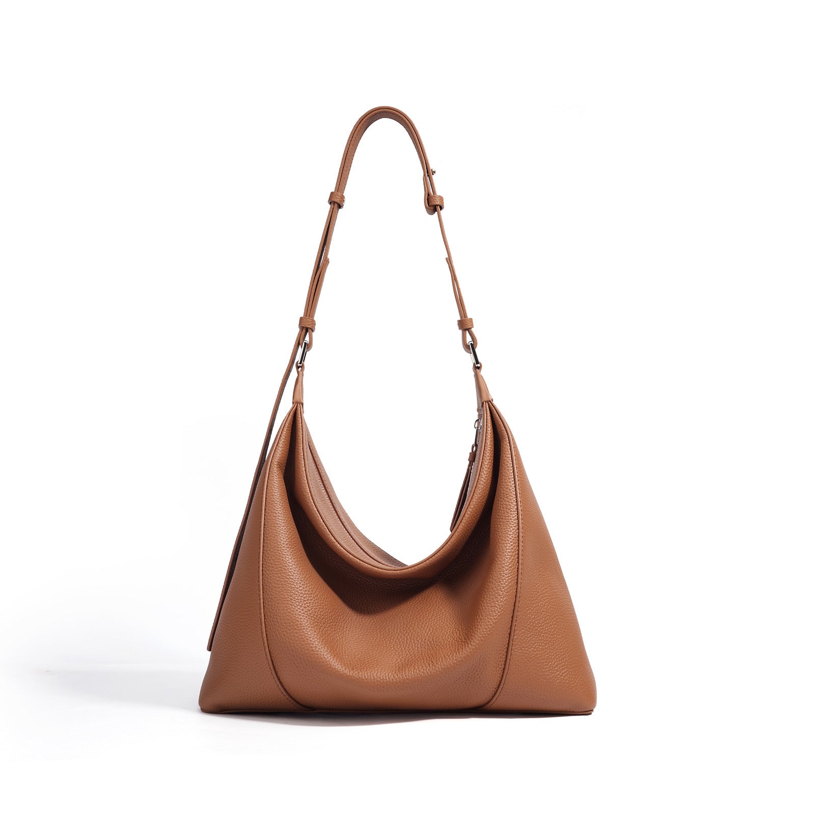 Brown leather handbag on a white background
