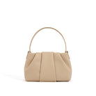 Beige handbag with a minimalist design on a white background