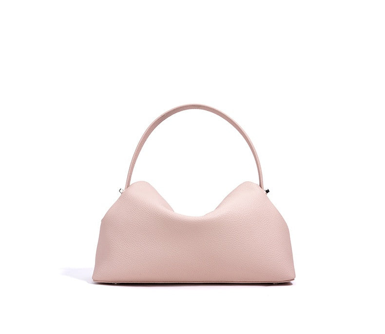 Pink handbag on a white background