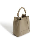 Beige handbag on a white background