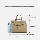 Beige handbag with measurements on a light gray background
