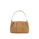 Tan handbag on a white background