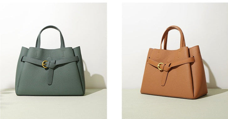 Set of handbags in various colors on a light background