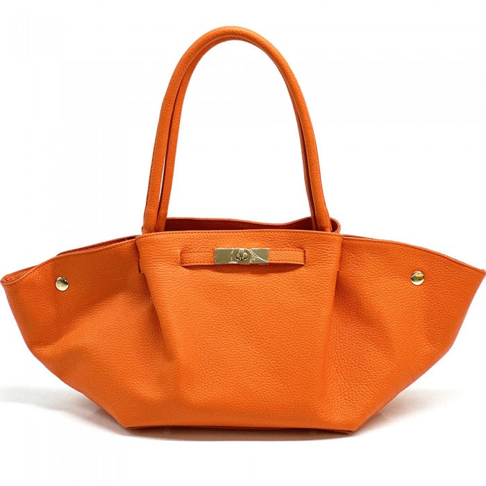 Orange handbag with gold accents on a white background