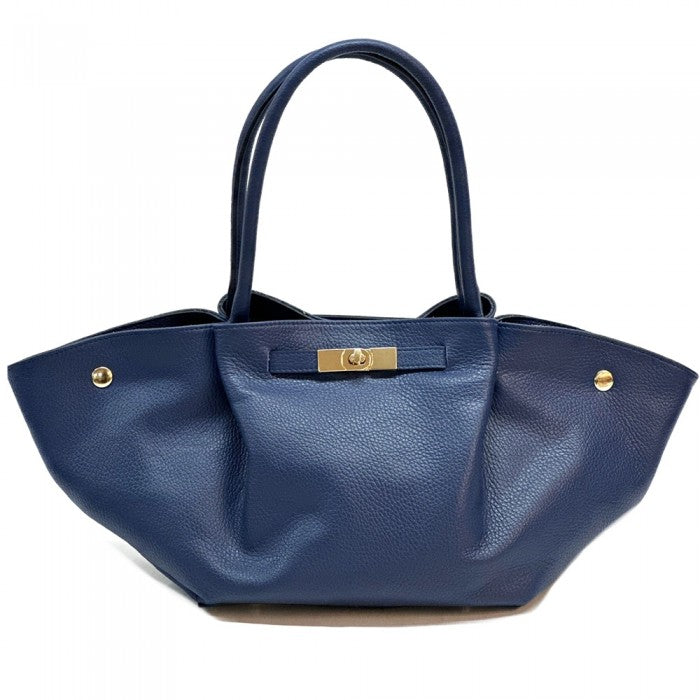 Blue handbag with gold accents on a white background