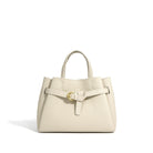 Beige handbag with a gold buckle on a white background