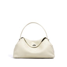 Beige handbag on a white background