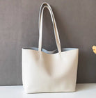 Beige tote bag on a gray background