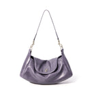 Purple handbag with a chain strap on a white background