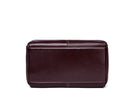 Brown leather clutch bag on a white background