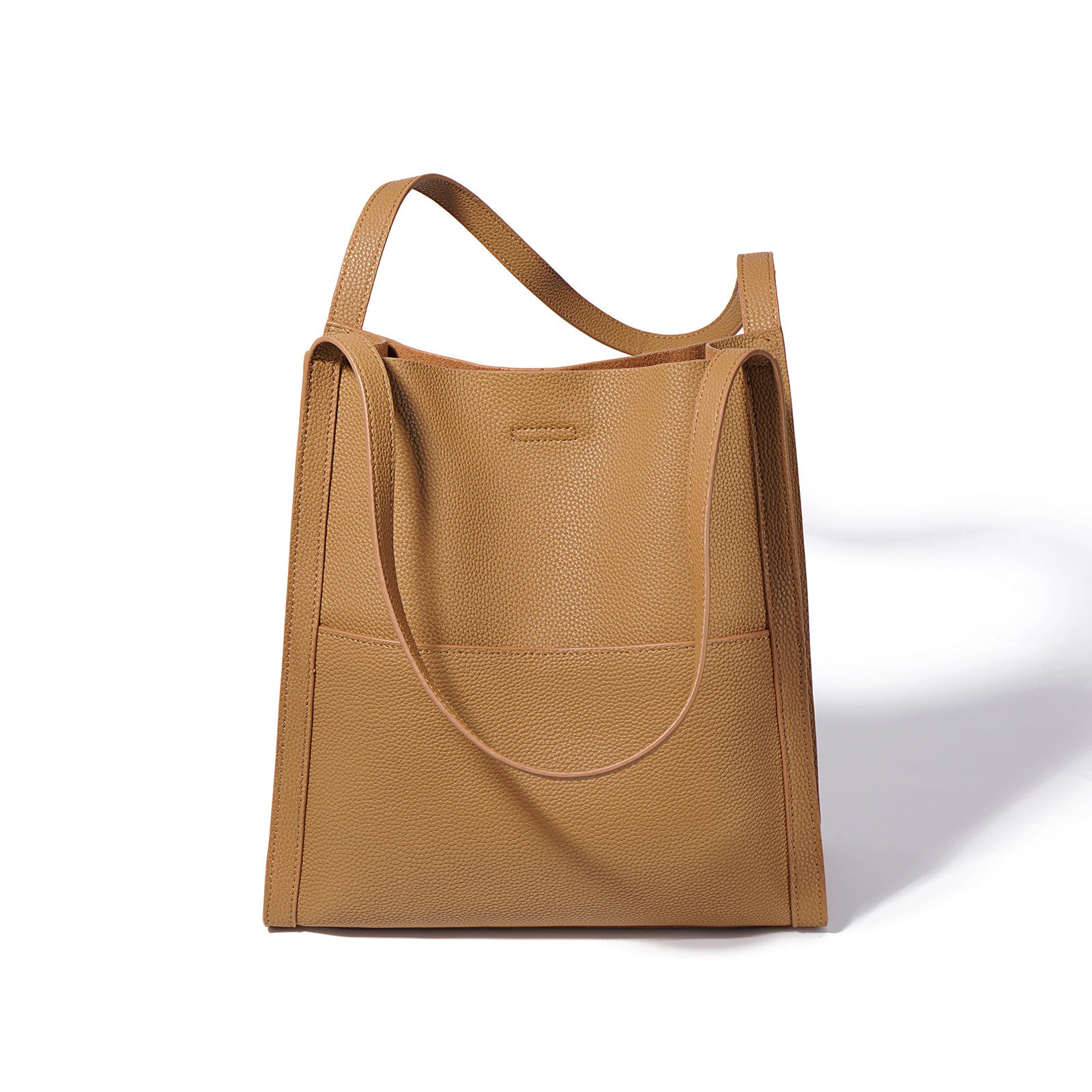 Brown leather tote bag on a white background