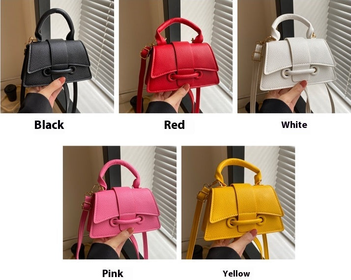 Five handbags in black, red, white, pink, and yellow held by a person against a neutral background.