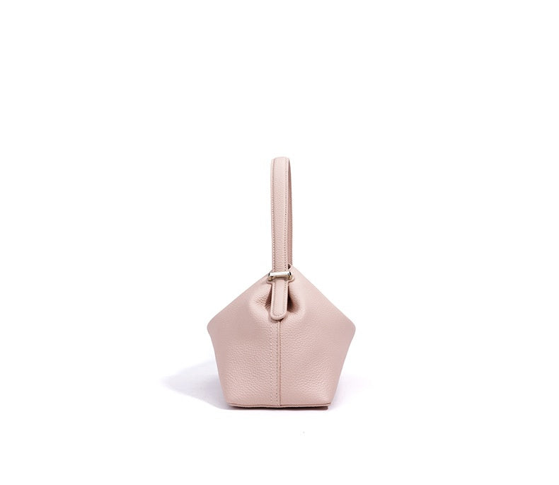 Pink handbag on a white background