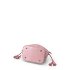 Pink textured handbag with tassels on a white background