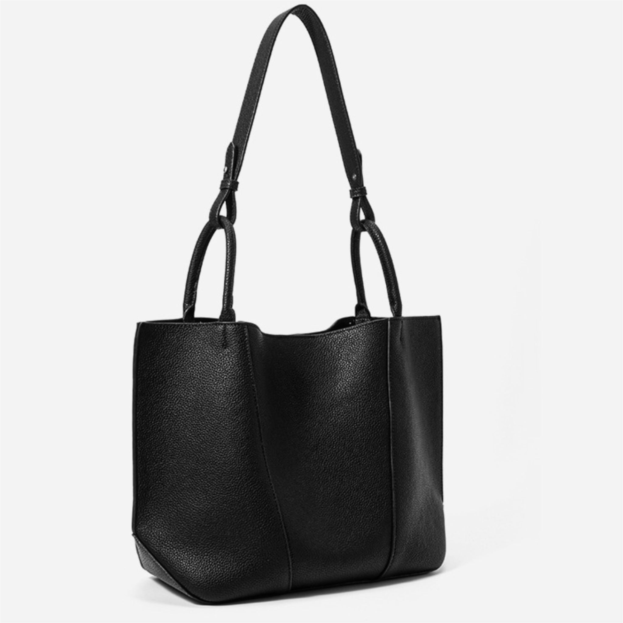 Black handbag on a white background