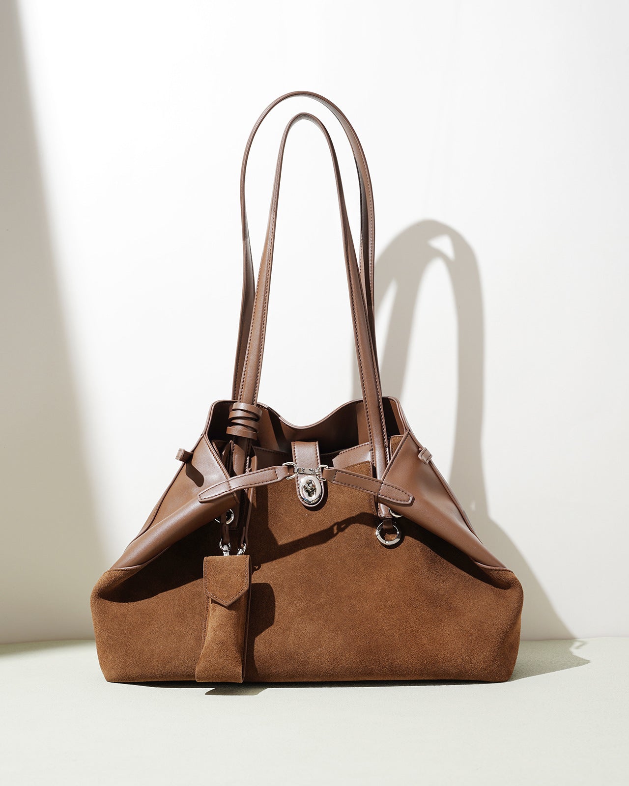 Brown handbag on a white background