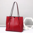 Red handbag on a light gray background
