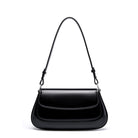 Black handbag with a strap on a white background