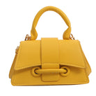 Yellow handbag with a prominent handle on a white background