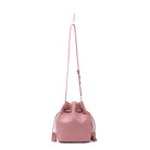 Pink woven drawstring bag on a white background