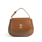 Brown handbag with a gold clasp on a white background