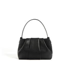 Black handbag on a white background