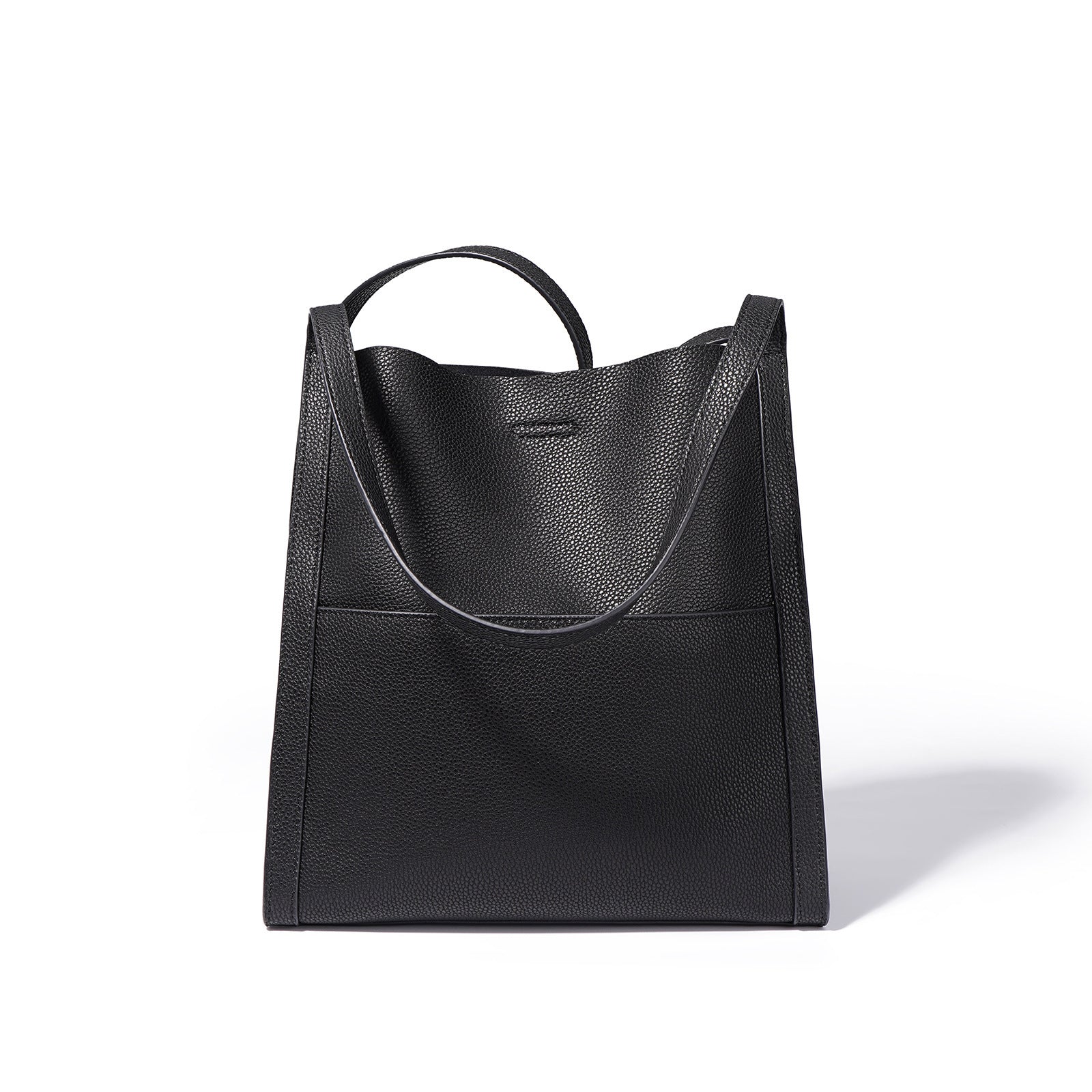 Black leather tote bag on a white background