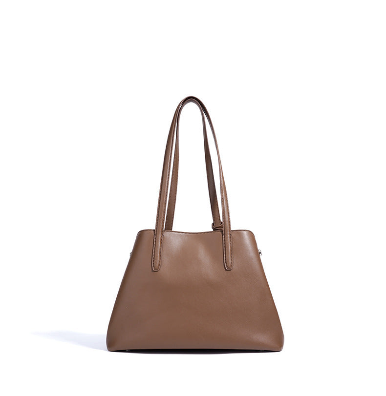 Brown handbag on a white background