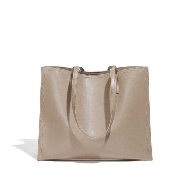 Beige tote bag on a white background