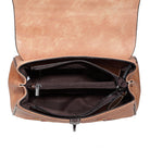 Brown leather bag with open interior on a white background