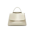 Beige handbag on a white background