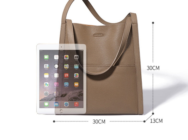 Brown handbag with an iPad mockup and dimensions on a white background