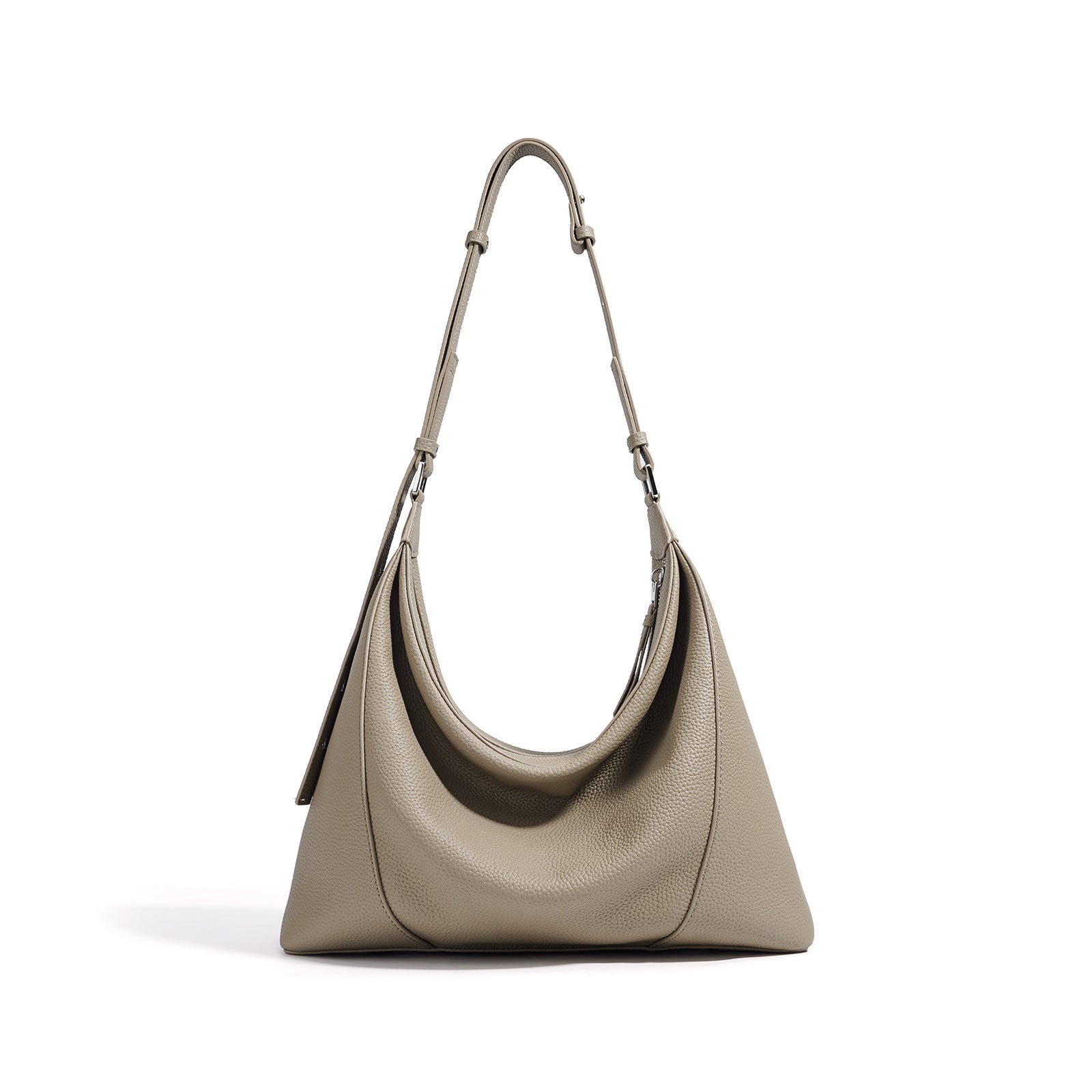 Beige handbag with a strap on a white background