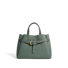Green handbag with a gold buckle on a white background