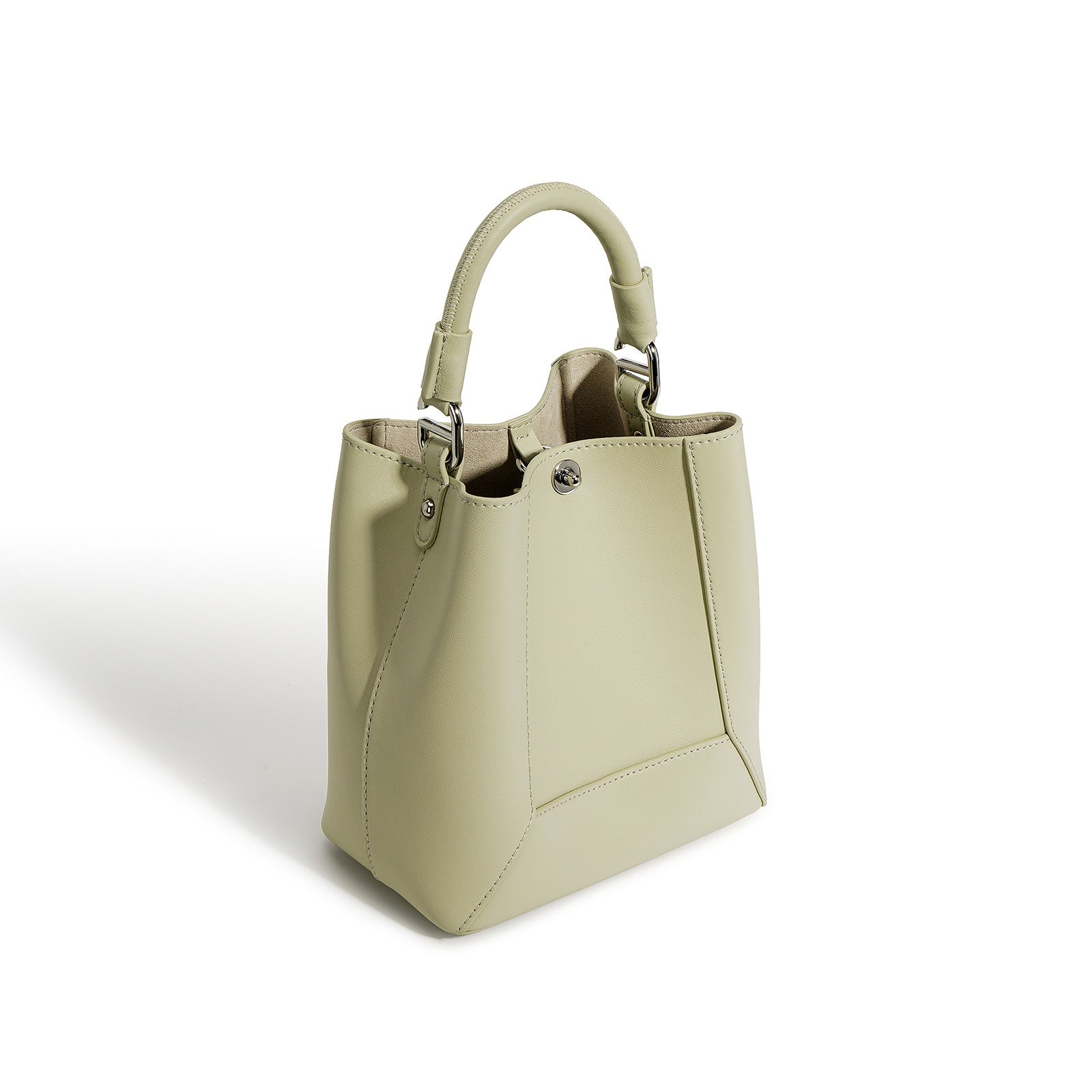 Light green handbag on a white background