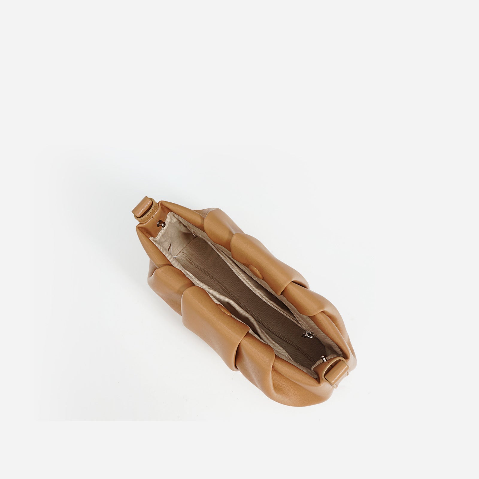 Tan leather clutch bag on a white background