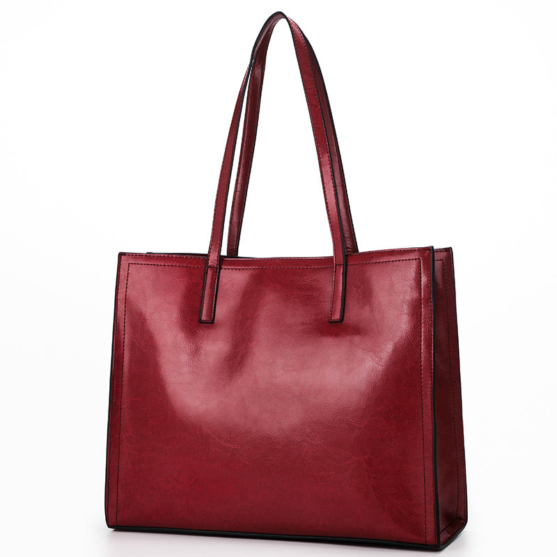 Red handbag on a white background