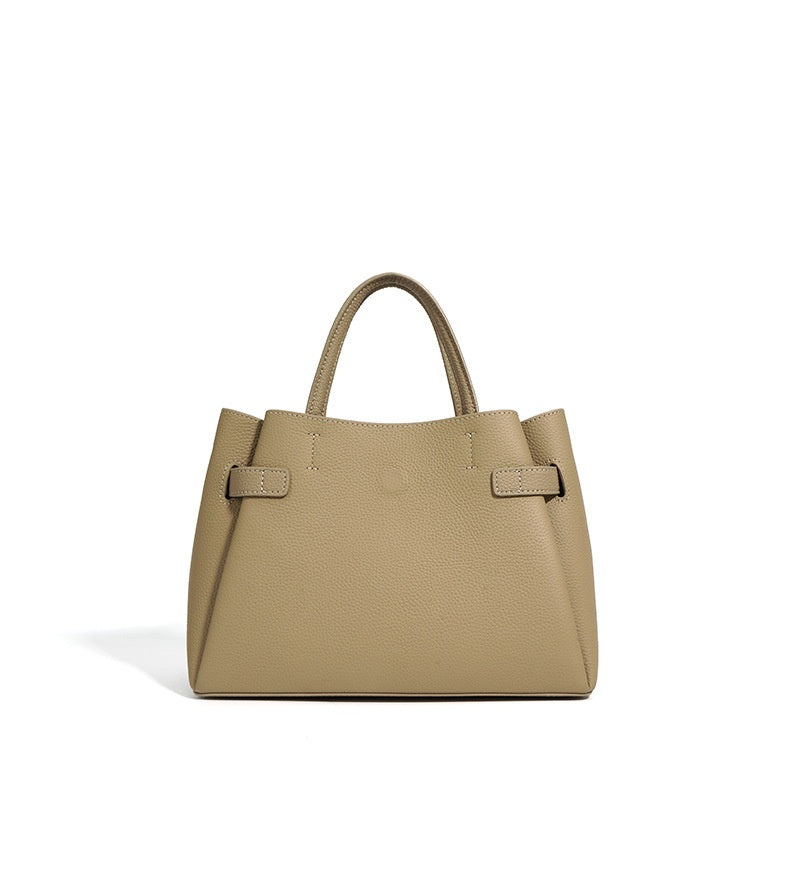 Beige handbag on a white background