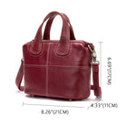 Red handbag with measurements on a white background